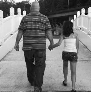Father and Daughter Holding Hands